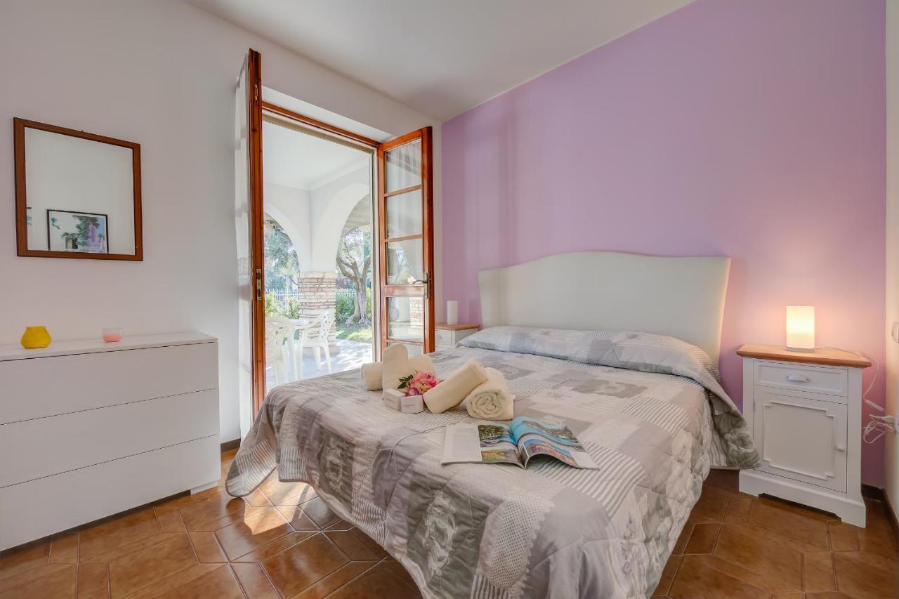 Villa Fiorita Apartments - Happy Rentals Sirmione Bagian luar foto